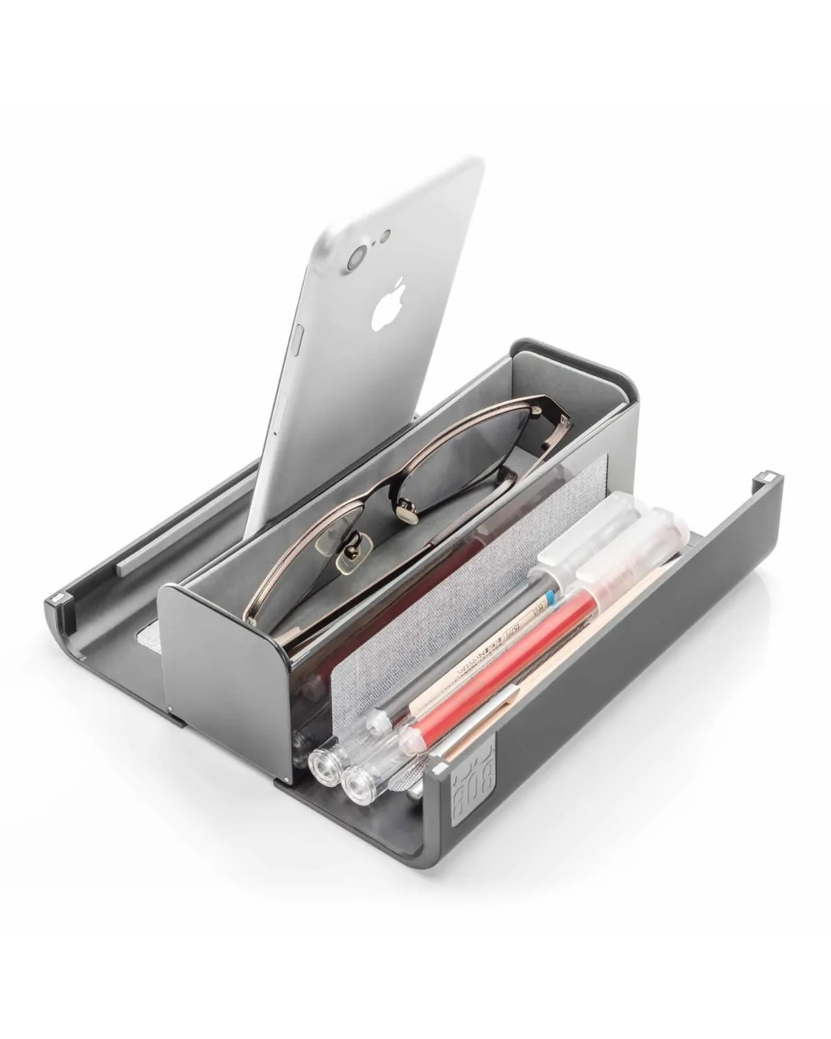 The BOB desk tidy holding a phone, glasses and pens, designed by Bang Creations