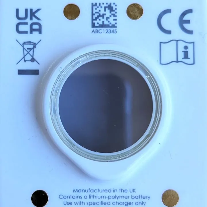 The back of a white product showing its compliance markings: the UKCA and CE marks, the crossed-out wheelie bin symbol, a data matrix code and the read-the-instructions symbol.